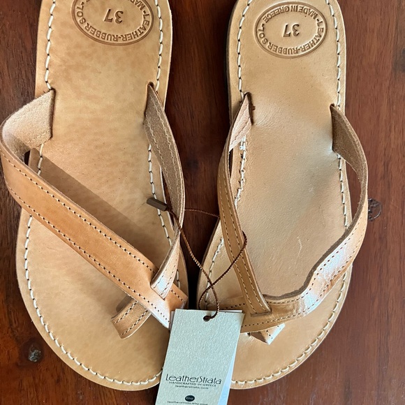 Leather sandals NWOT color of sandals is the picture in bag. - Picture 2 of 4